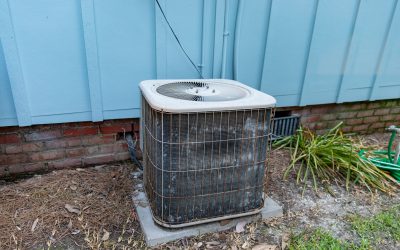 Is my air conditioning unit in need of repair or replacement?